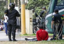 Dos venezolanos detenidos por herir a un policía
