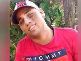 Acribillan a tiros a un joven frente a su casa