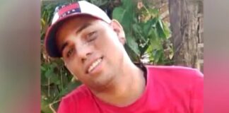 Acribillan a tiros a un joven frente a su casa